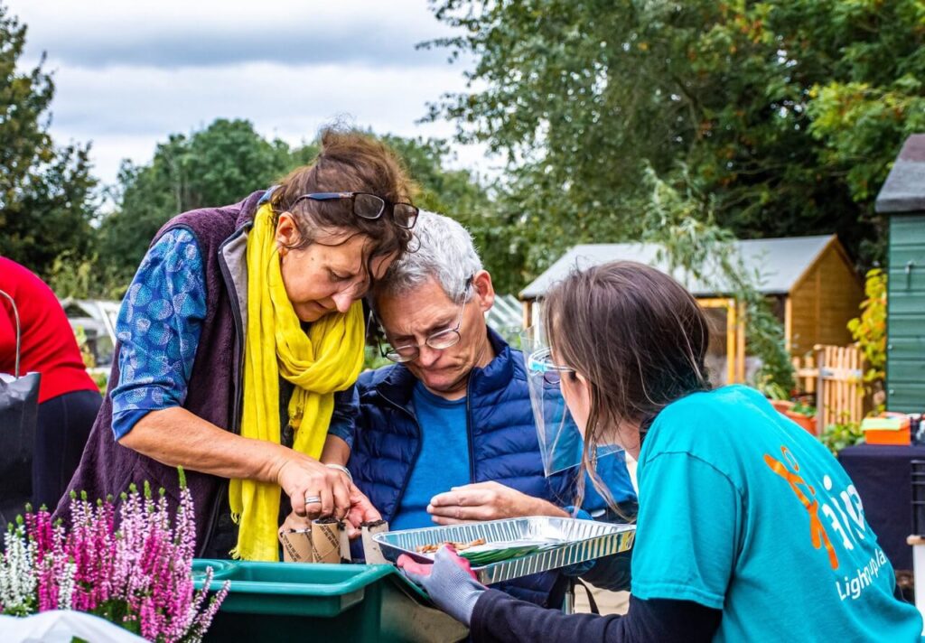 people gardening at community garden project
