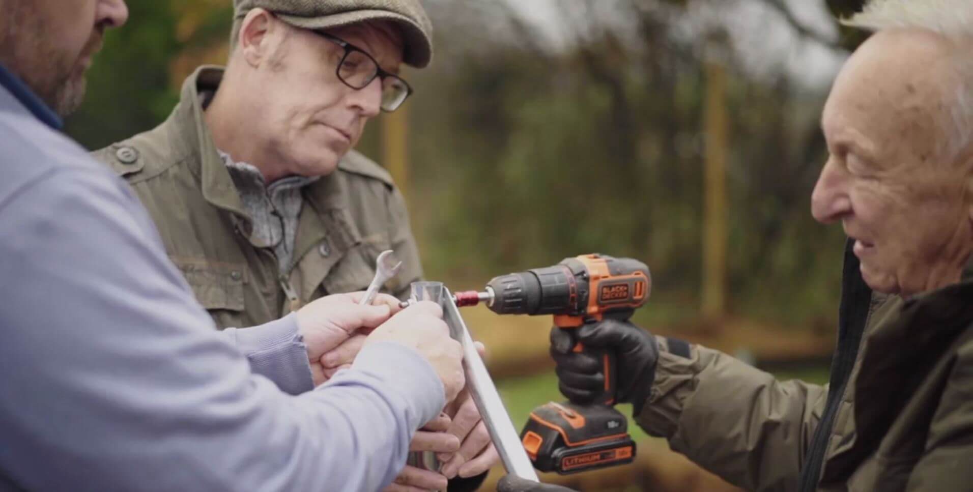 three men drilling and mending